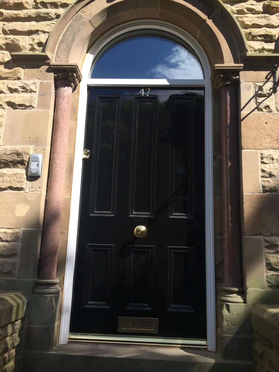 Arched stone cottage front door by MW Joinery